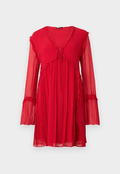 Red, long-sleeve dress with a V-neck, tie detail, and ruffled accents. Made of lightweight, textured fabric with a flowy silhouette.
