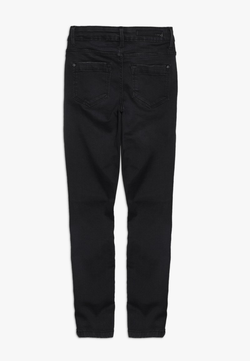 Jean noir slim avec deux poches arrière et passants pour ceinture, vu de dos sur fond blanc.