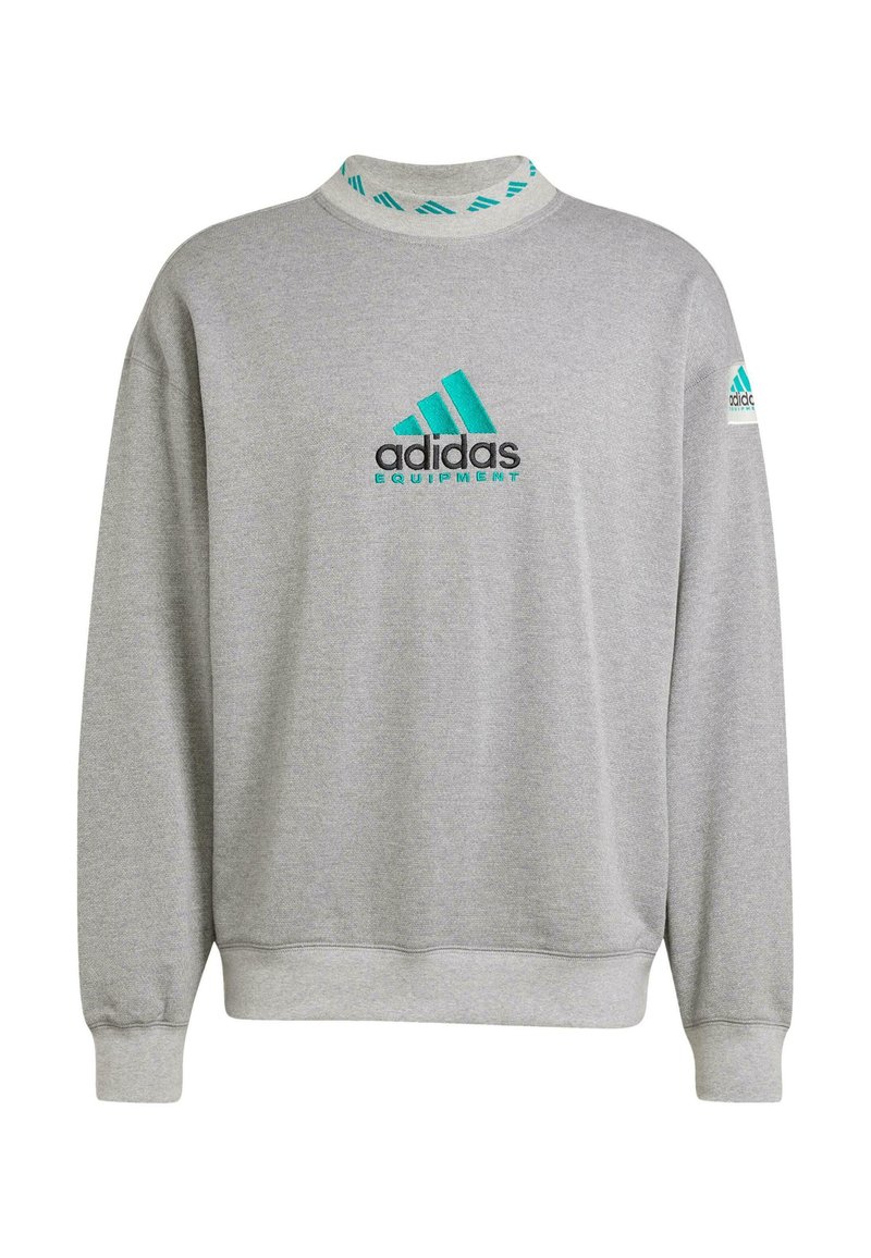Grå sweatshirt i mjukt tyg, med hög halsringning, turkos Adidas-logga och kontrasterande detaljer på ärmsluten och kragen.