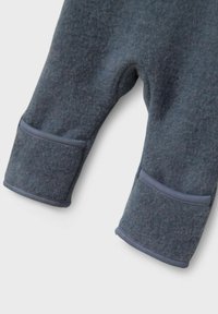 Fleece-Hosen in Marineblau mit weicher Textur. Verfügt über gerippte Bündchen und kontrastierenden Saum. Eignen sich für Freizeitkleidung.