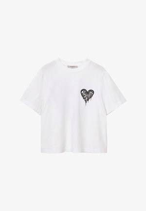 T-shirt bianco in cotone dalla vestibilità rilassata, con una grafica di un cuore nero colante sull'area sinistra del petto. Maniche corte e collo tondeggiante.