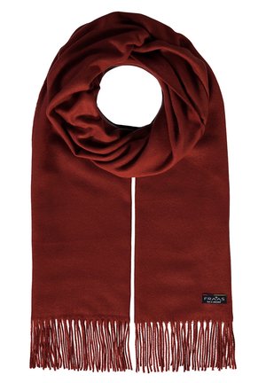 Sciarpa color ruggine realizzata in materiale morbido, con orlo frangiato e un piccolo logo di marca. Ripiegata in uno stile ad anello per maggiore calore.