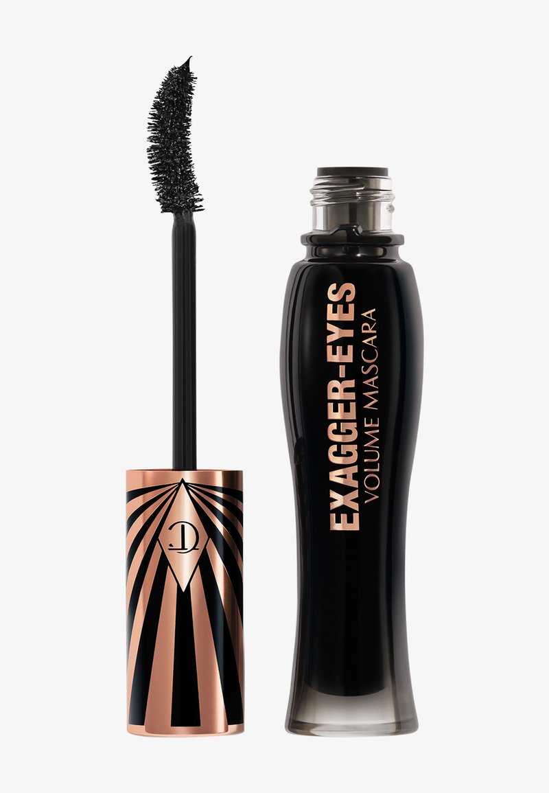 Tube de mascara noir à forme effilée et finition brillante, avec un capuchon rayé en or rose et un texte en gras. Accompagné d'une brosse incurvée.
