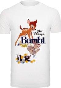 Hvitt bomulls T-skjorte med et grafisk bilde av Bambi, et rådyr, sammen med Thumper kaninen og Flower stinkdyret, omgitt av fargerike blomster.