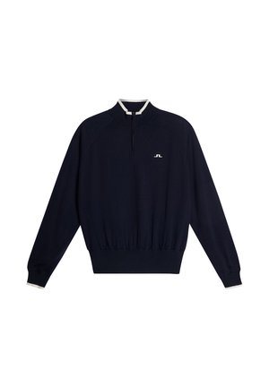 Navy pullover with a half-zip collar, white accents at the neckline and cuffs, elasticated hem, and a small logo on the chest.