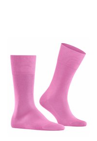 Calzini di cotone rosa con un design a colore solido, caratterizzati da una fascia a coste, una texture liscia e una lunghezza fino al polpaccio.