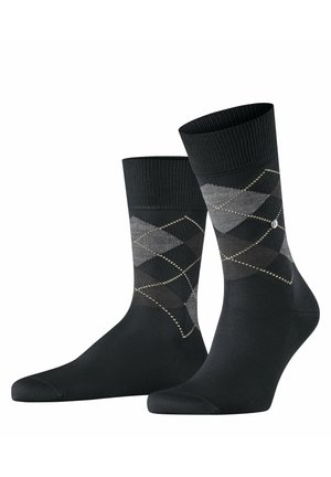 Black and gray argyle pattern socks with a ribbed cuff, featuring a diamond design and small decorative accents. Made from soft, comfortable fabric.