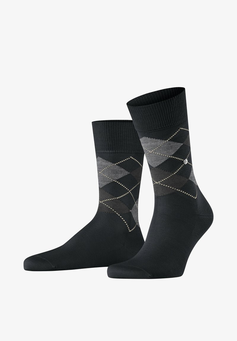 Czarno-szare skarpetki w wzór argyle z żeberkowym mankietem, z charakterystycznym wzorem diamentów oraz małymi dekoracyjnymi akcentami. Wykonane z miękkiego, komfortowego materiału.