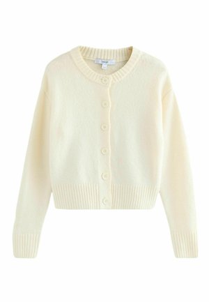 Krémový cardigan s kulatým výstřihem, žebrovaným lemem a texturovaným materiálem. Obsahuje šest knoflíků na přední straně a dlouhé rukávy.