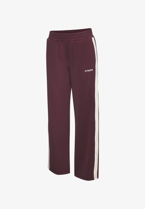 Burgunderfarbene Sporthose mit weitem Bein, elastischem Bund, seitlichen weißen Druckknöpfen und dem Schriftzug "CPNHGN" in Weiß auf der Vorderseite.