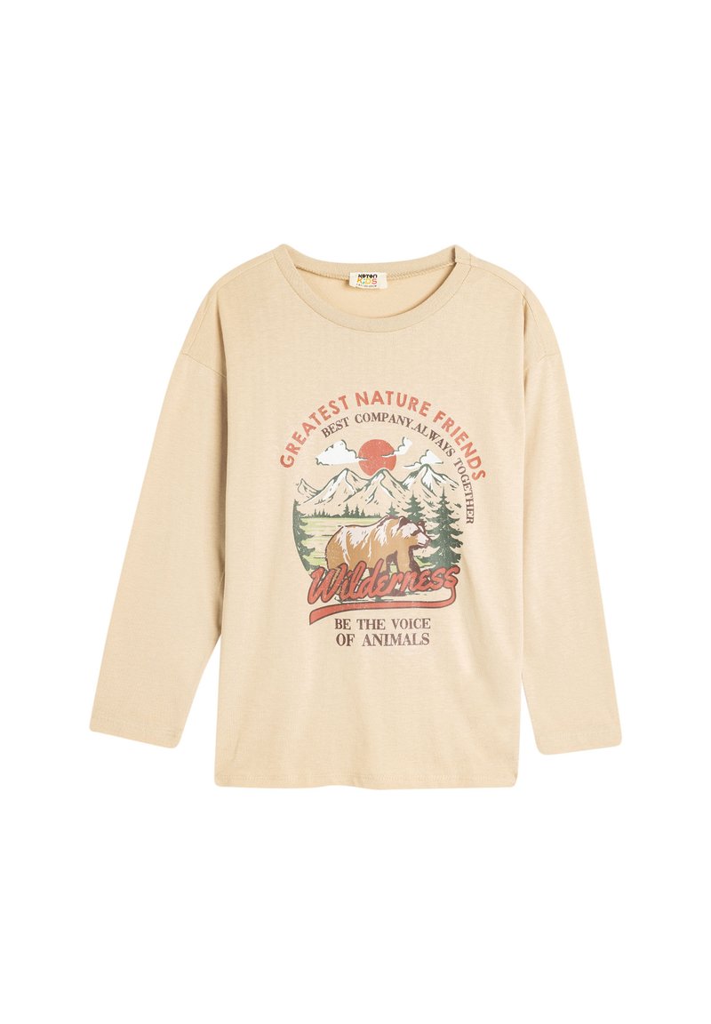 Beżowa, długorękawowa koszula z miękkiej bawełny z graficznym wzorem w stylu vintage, przedstawiającym góry, niedźwiedzia i tekst o naturze. Okrągły dekolt i luźny krój.
