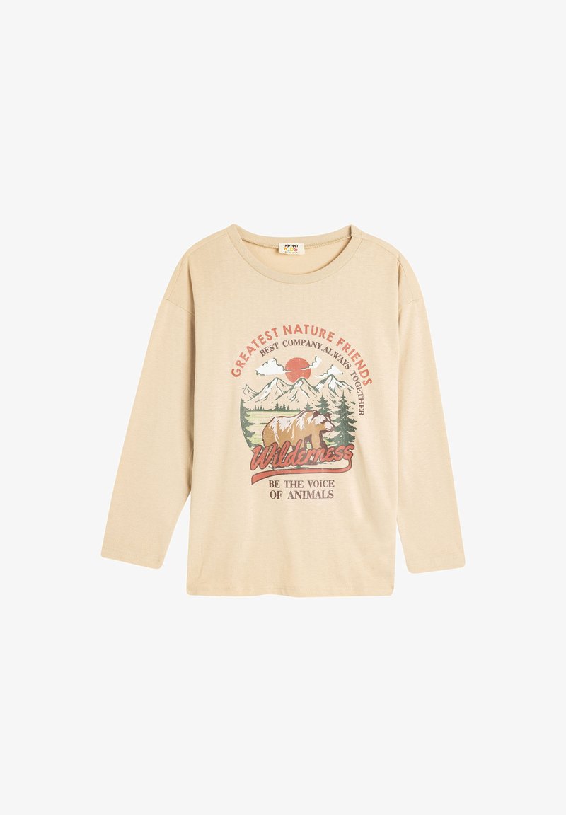Beżowa, długorękawowa koszula z miękkiej bawełny z graficznym wzorem w stylu vintage, przedstawiającym góry, niedźwiedzia i tekst o naturze. Okrągły dekolt i luźny krój.