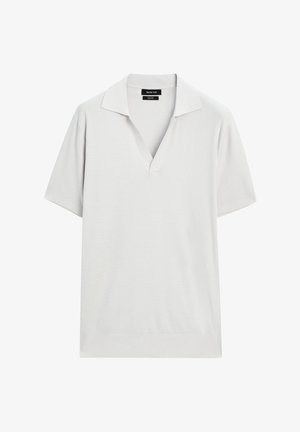 Kurzarm-Polohemd aus leicht grauem strukturiertem Strick. Mit V-Ausschnitt und klassischem Kragen. Die Säume sind mit einem dezenten Rippenmuster veredelt.