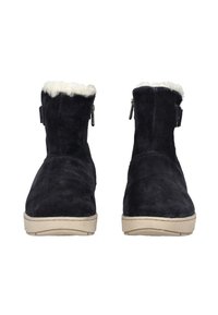 Dark blue suede ankle boots with a white faux fur lining, side zipper, and a tan rubber sole. Sturdy design and textured surface.