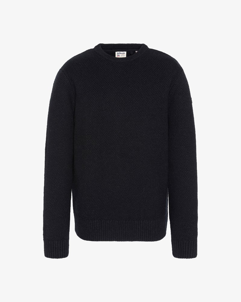 Gestrickter schwarzer Pullover mit klassischem Rundhalsausschnitt, strukturiertem Stoff sowie gerippten Bündchen und Saum. Etikett am Halsausschnitt sichtbar.