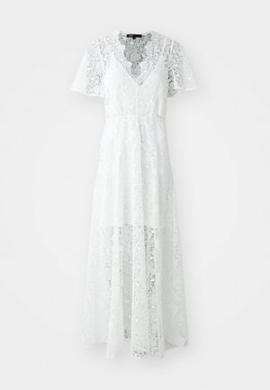 White lace dress with short sleeves, v-neckline, and a flowing design. Features intricate floral patterns and a semi-sheer finish.