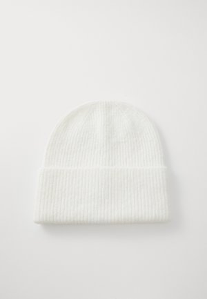 Berretto a maglia bianco a coste con risvolto. Texture morbida con linee verticali, parte superiore arrotondata e design senza cuciture. Adatto per il freddo.