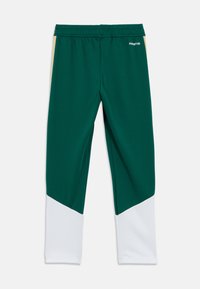 Πράσινο αθλητικό παντελόνι με ελαστική μέση, που διαθέτει λευκές και κίτρινες γεωμετρικές χρωματικές πινελιές στο τελείωμα. Κατασκευασμένο από λείο ύφασμα.