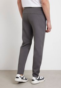 Guess MID WAIST JOGGING - Jogginghose - dunkelgrau