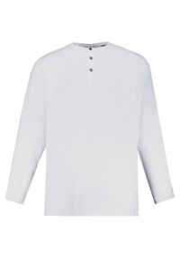 Camisa blanca de manga larga con cuello redondo, tapeta de tres botones y un sutil detalle de logo. Fabricada en un tejido ligero y texturizado.