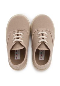 Pair of beige canvas toddler shoes with white laces and rubber soles, viewed from above on a white background.