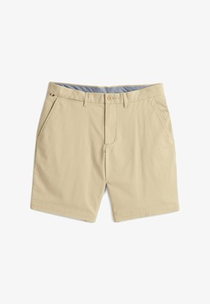 Beige Shorts aus einem Baumwoll-Mix mit Knopfverschluss, zwei seitlichen Taschen und einem kontrastierenden blauen Bundfutter.