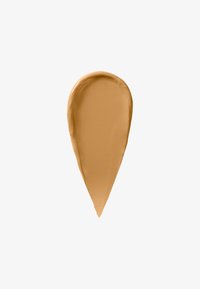 Flytende foundation swatch i dråpeform, jevn tekstur, kremet konsistens, varm beige farge.