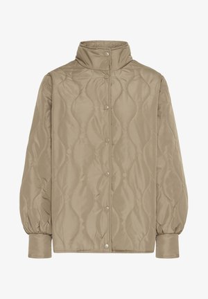 Veste matelassée beige avec un col haut, fermeture à pression et manches bouffantes. Texture lisse avec un motif en vague sur le tissu.