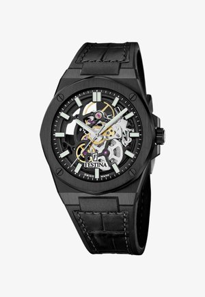Schwarze Festina-Armbanduhr mit sichtbarem Skelettwerk, leuchtend silbernen Zeigern, Stundenmarkierungen und schwarzem, mit Nähten versehenem Lederarmband.