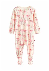 Tutina con i piedi in tessuto crema con un motivo ripetuto di fiocchi rosa e cuori, dotata di chiusura frontale a pressione e maniche lunghe.