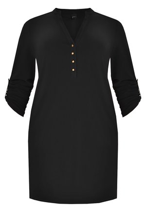 Schwarze Tunika mit V-Ausschnitt, drei goldenen Knöpfen und hochgekrempelten Ärmeln. Aus glattem Stoff mit einer lockeren, fließenden Form.