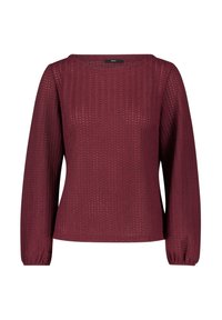 Haut bordeaux à manches longues en tissu tricoté texturé, avec un décolleté carré et des poignets froncés. Motif en zigzag distinct sur l'ensemble.
