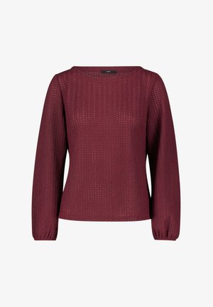 Burgunderfarbener Langarm-Top aus strukturiertem Strickstoff, mit quadratischem Ausschnitt und gerafften Ärmelabschlüssen. Deutliches Zickzack-Muster über das gesamte Kleidungsstück.