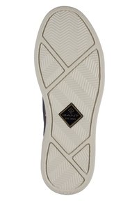 White rubber shoe sole with herringbone pattern, featuring a diamond logo plaque with "GANT EST. 1949" in black. Textured for grip.