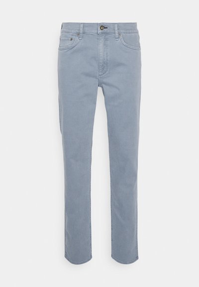 Light blue denim jeans with a straight cut, button closure, and five-pocket design. Features subtle stitching details and a smooth texture.