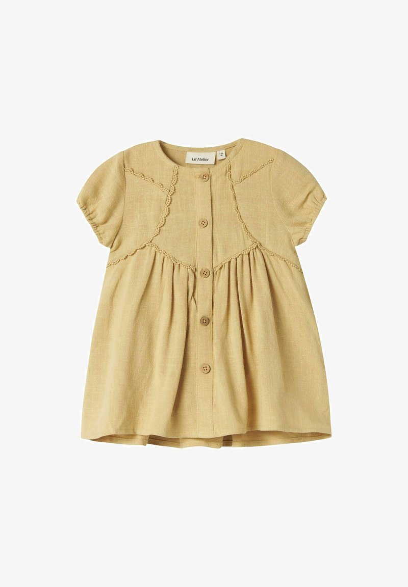 Abito in lino giallo con maniche corte a sbuffo, apertura frontale con bottoni e cuciture decorative lungo il corpetto e le spalle.