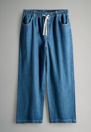 Pantalones de mezclilla anchos azul con cintura elástica y cordón. Cuenta con dos bolsillos laterales y un diseño informal.