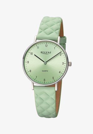 Montre en quartz vert menthe avec un bracelet en silicone texturé à motif de diamant. Le cadran présente des chiffres et des aiguilles argentés avec une finition brossée.