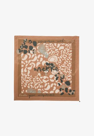 Foulard quadrato con forme organiche astratte beige, marroni e nere, testo "Anekke" al centro e "your uniqueness" scritto lungo i bordi.
