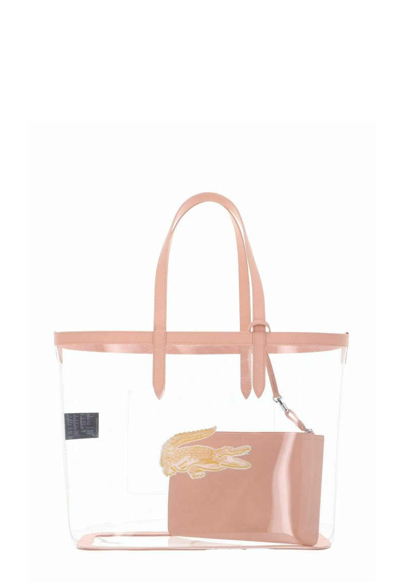 Borsa a tracolla trasparente con manici e rifiniture rosa, contenente una pochette rosa abbinata con un emblema di coccodrillo.