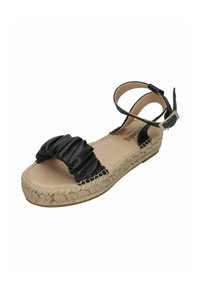 Black leather espadrille sandal with a ruched front strap, woven jute midsole, and adjustable ankle strap featuring a buckle.