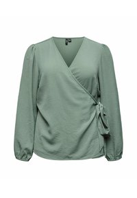 Mintgrønn omslagsbluse med lange, puffede ermer, knytebånd i midjen og teksturert finish. V-halsdesign med myk drapering.