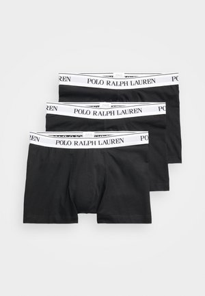 Juodi bokseriai iš medvilnės su baltu elastingu juosmeniu, ant kurio juodu spauda parašyta "POLO RALPH LAUREN". Pakuotėje trys vnt.