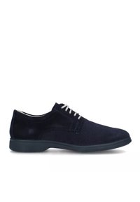 Scarpe in suede blu navy con una superficie texturizzata, dotate di lacci bianchi, punta arrotondata e suola in gomma flessibile.