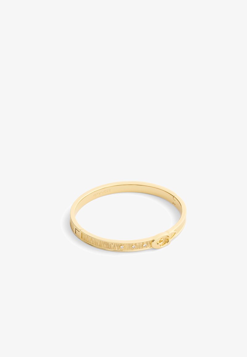 Gold-toned bangle bracelet with engraved lines, three small embedded crystals, and a circular clasp detail on a white background.