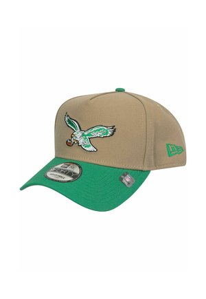 Adjustable baseball cap with a khaki fabric body and a green brim. Features an embroidered eagle design in green and white.