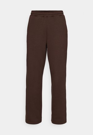Brown sweatpants with a comfortable elastic waistband, tapered leg design, and soft texture. Feature a subtle embossed brand logo.