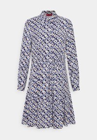 Robe à manches longues avec col, motif géométrique circulaire bleu, blanc et orange, taille froncée et jupe à volants.