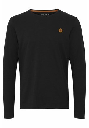 Black long-sleeve T-shirt made of cotton, featuring a round neckline and a small brown logo patch on the left chest area.