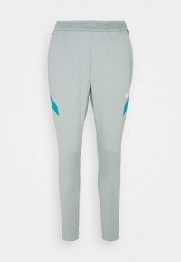 Hellgraue Sporthosen mit enganliegendem Design, versehen mit türkisfarbenen Akzenten an den Seiten und dem Nike-Logo. Hergestellt aus glattem, dehnbarem Stoff.